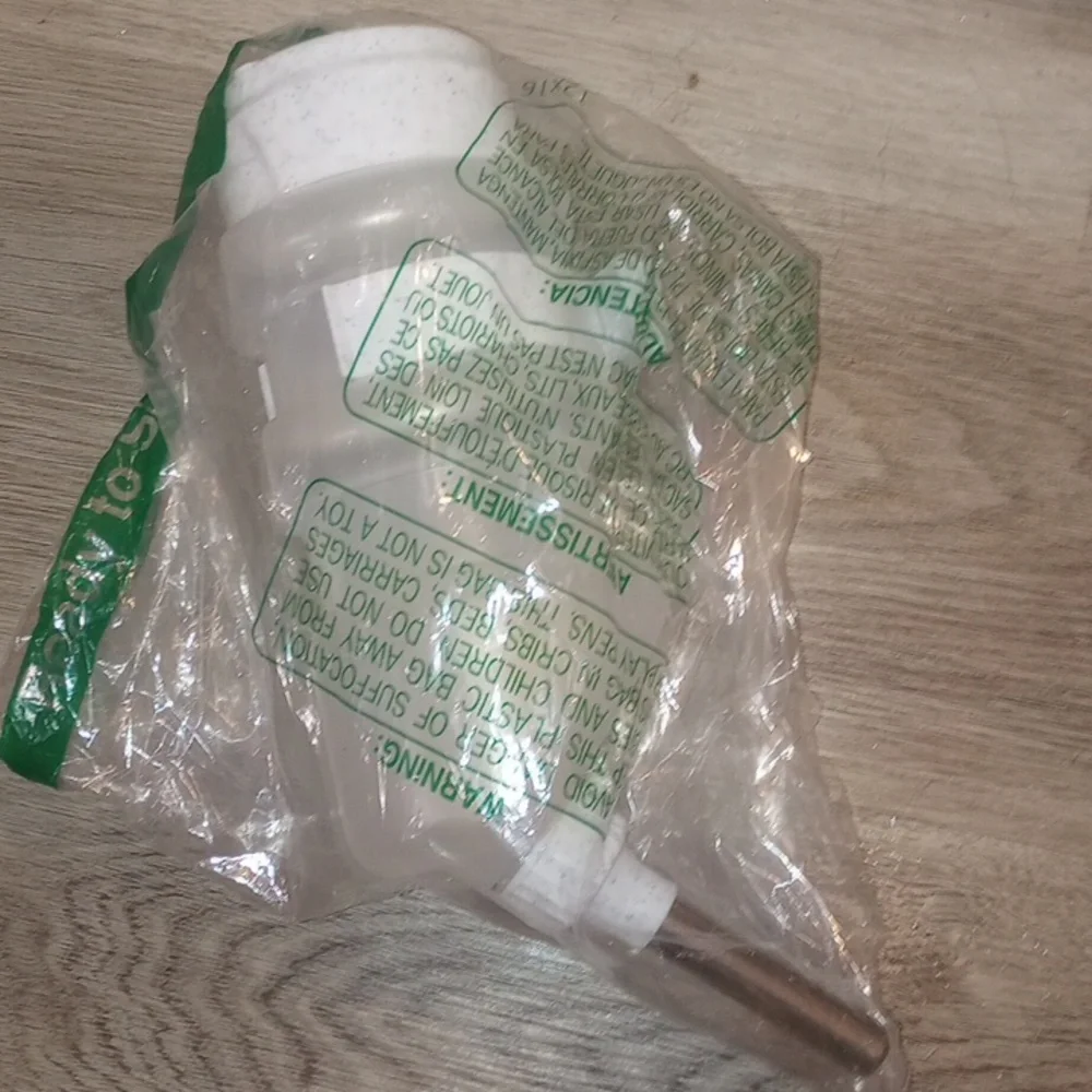 Hanging water bottle for large pets.